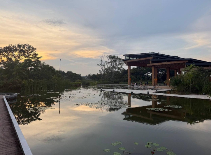 Tranquil Reflections: Embracing the Serenity of a Sunset by the Waterside Pavilion